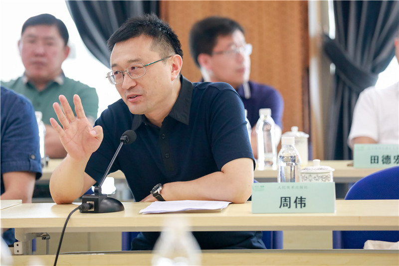 人民美術出版社社長周偉作主題.jpg